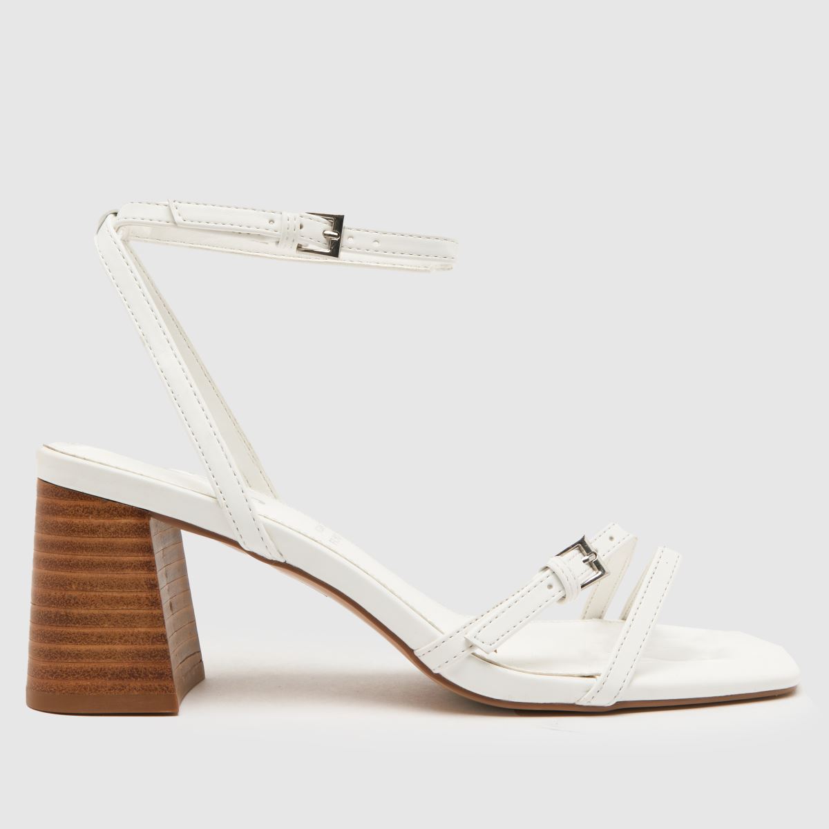 schuh saturn strappy block high heels in white schuh saturn strappy block high heels in white