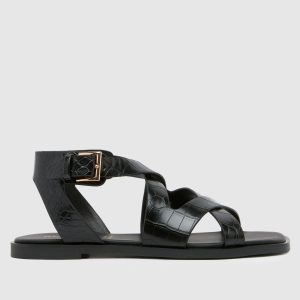 schuh tide croc flat sandals in black