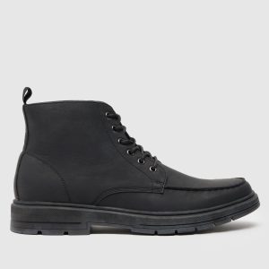 schuh dusty apron boots in black