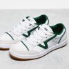 Vans Lowland trainers in white and green with gum sole