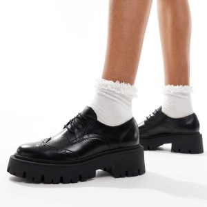 schuh Liora chunky brouges in black leather