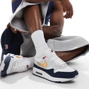 Nike Air Max 1 SC trainers in white, navy and gold