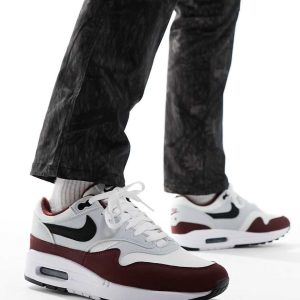Nike Air Max 1 trainers in white and burgundy