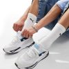 Puma Mirage sport trainers in white and blue