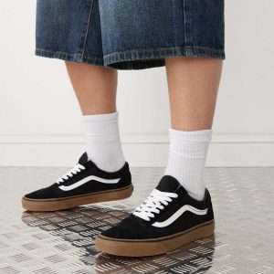 Vans Old Skool trainers in black with gum sole