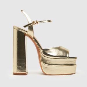 schuh shay platform high heels in gold